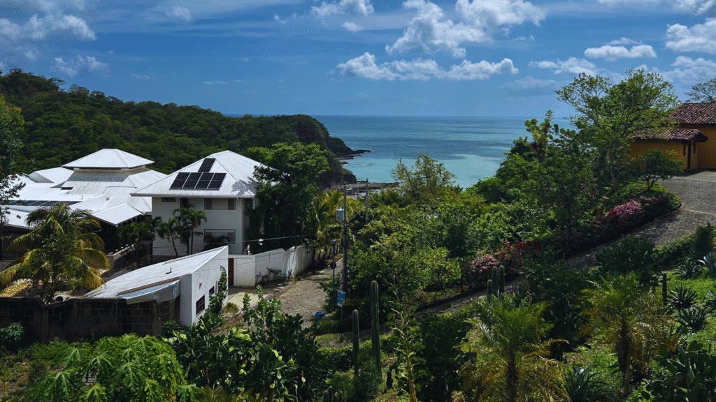 Scenic coastal view of San Juan del Sur, ideal for exploring with a motorcycle rental in Nicaragua.